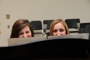Abby and Jennifer behind music stand